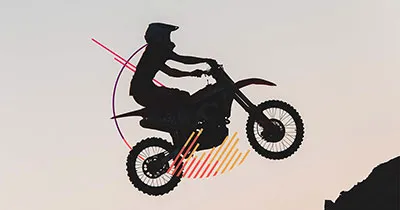 Why You Need to Evel Knievel the AI Gap, a silhouette of motorcyclist in midair accented with sunset colors of red, orange and yellow