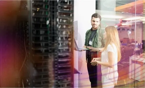 Two People Speaking At Work