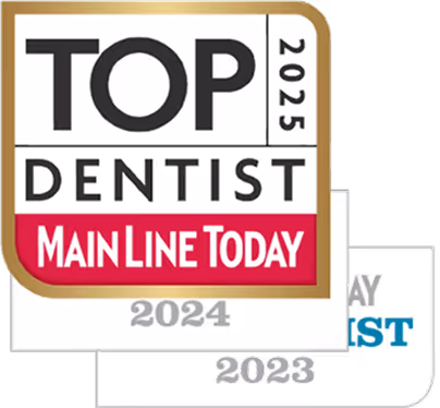 A top dentist badge with the words top dentist.