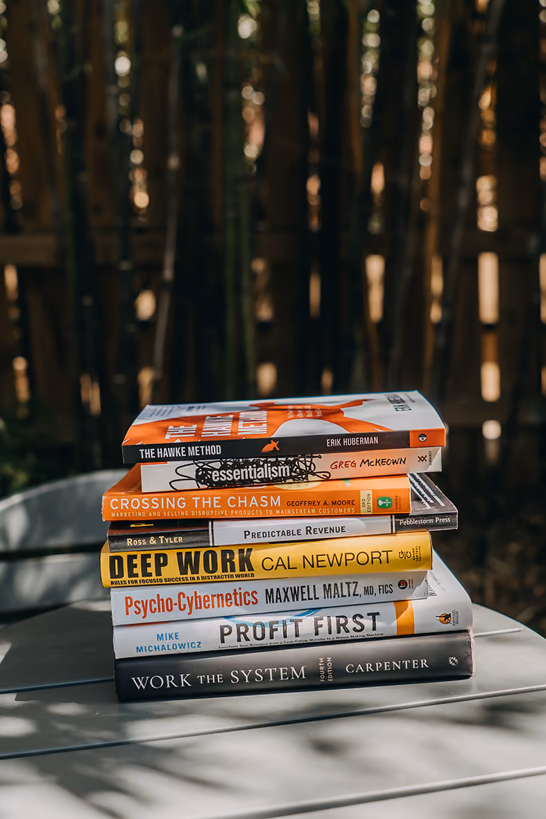 Stack of business books for creative business owners