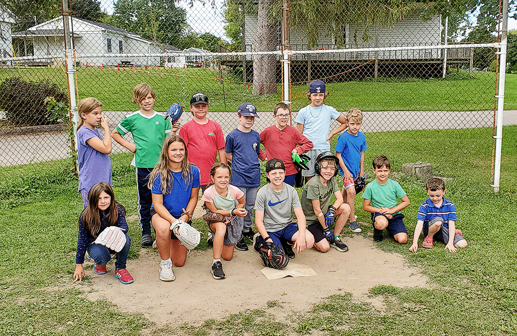 Young adults playing volleyball