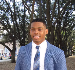 A headshot of debater Zion Dixon