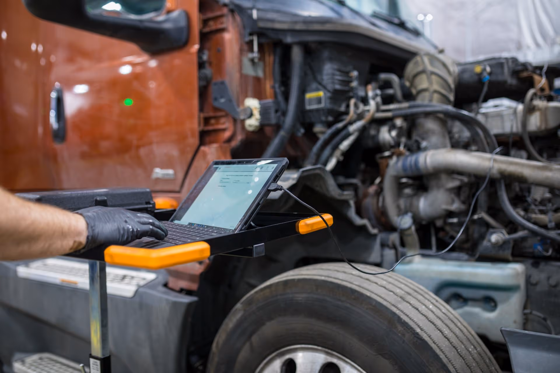Mechanic performing diesel engine diagnostics at Schroeder Truck Repair