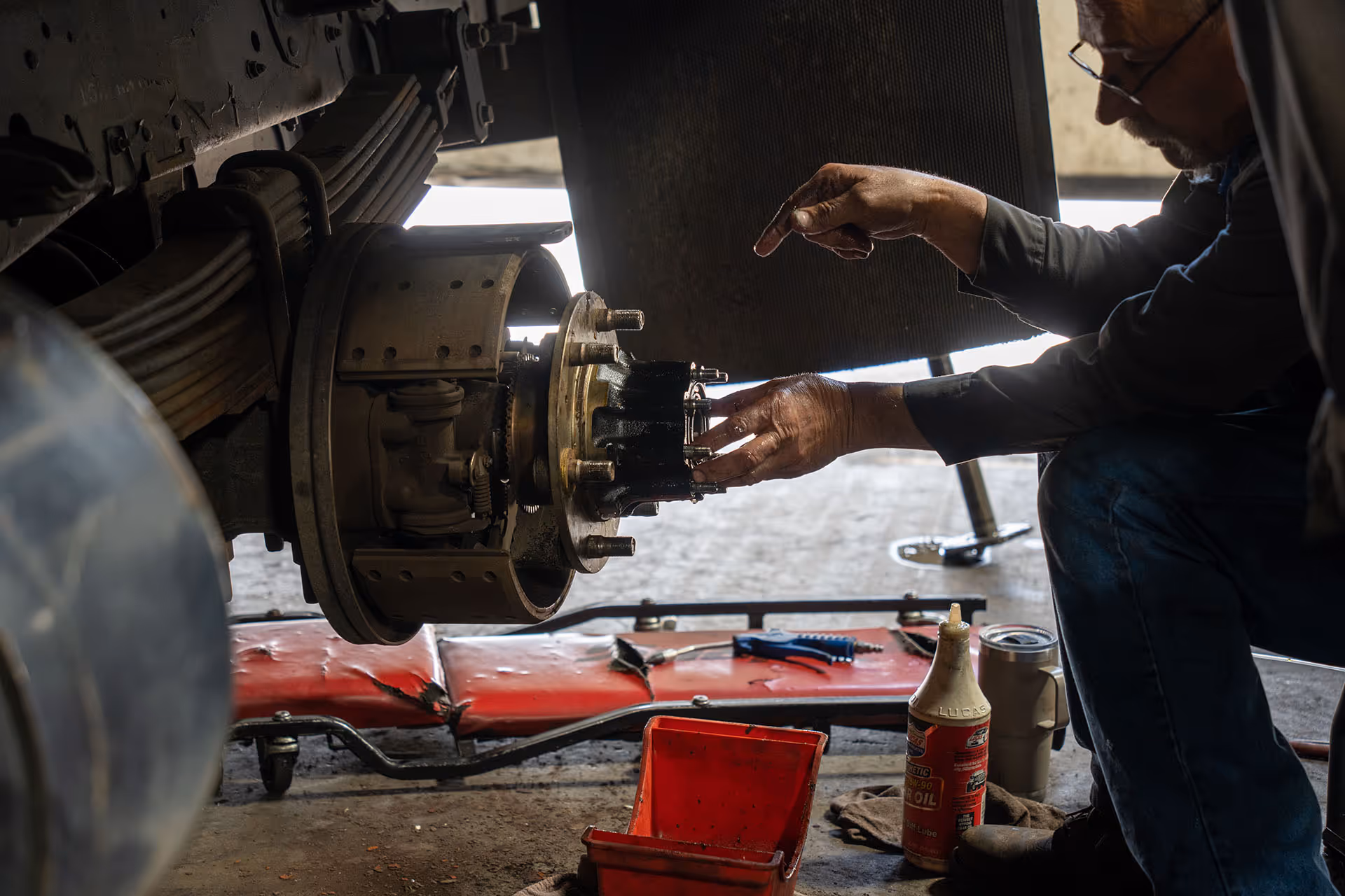 Schroeder Truck Repair mechanic performing breakdown service on vehicle.