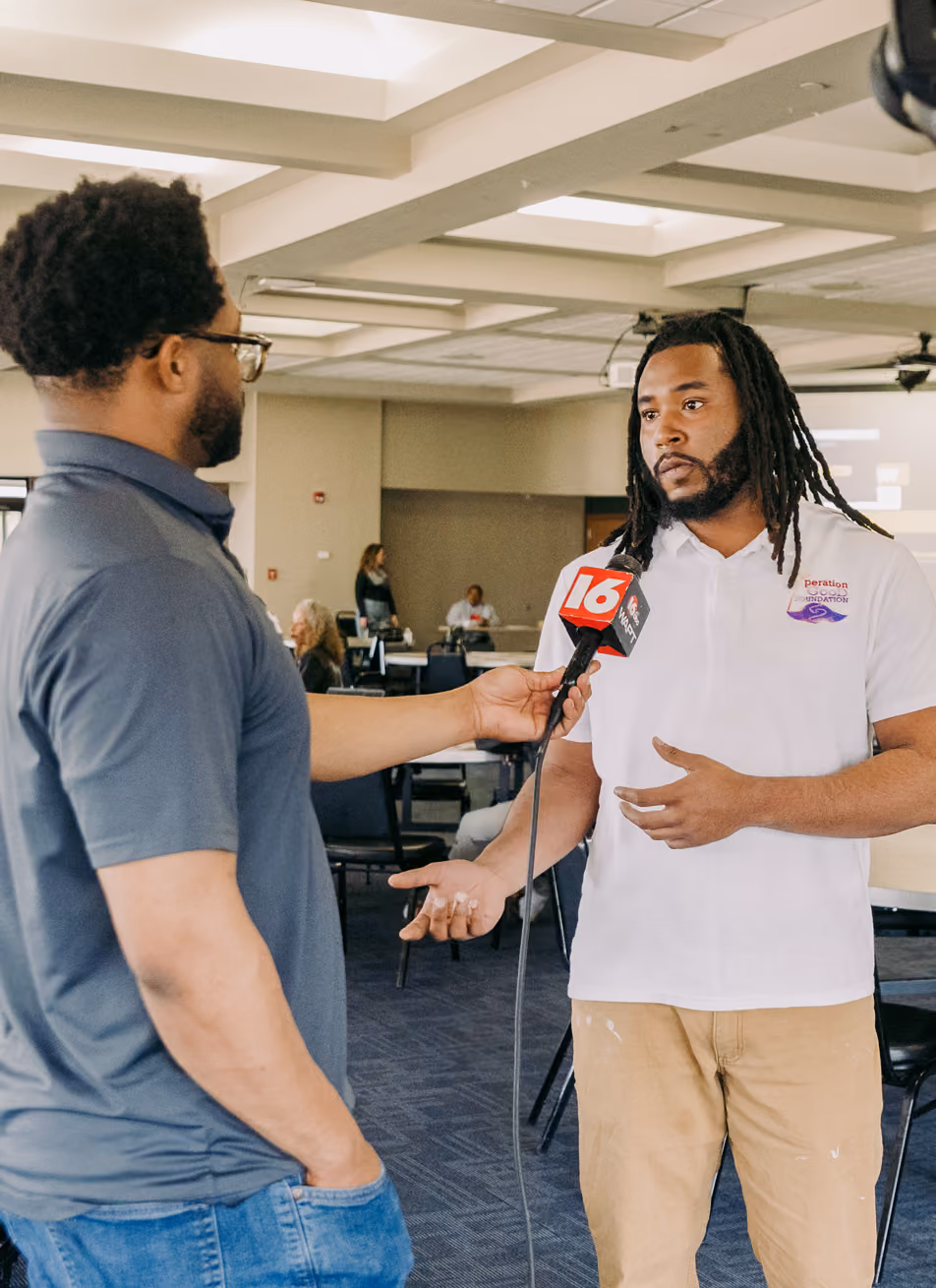 Young black male being interviewed about public safety in his community. 