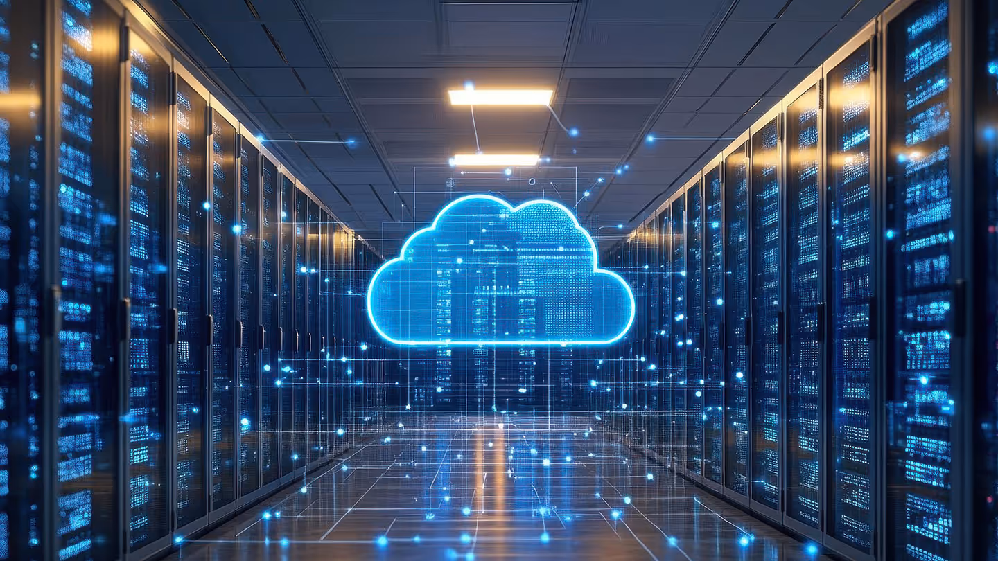 Data centre aisle with server racks and a glowing blue digital cloud icon floating in the centre.