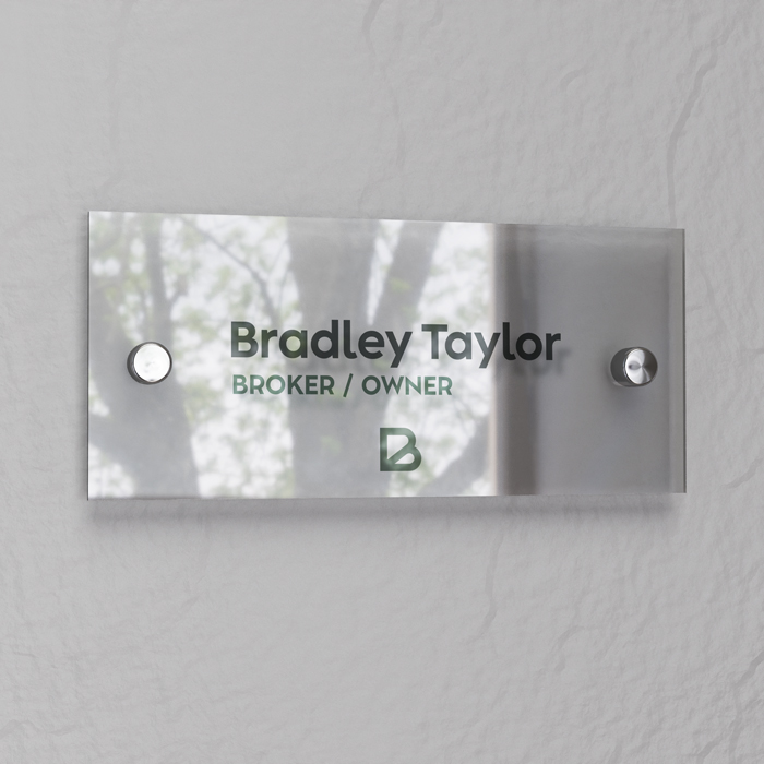 Executive office nameplate reading "Bradley Taylor" which features the Bradley Taylor logo.