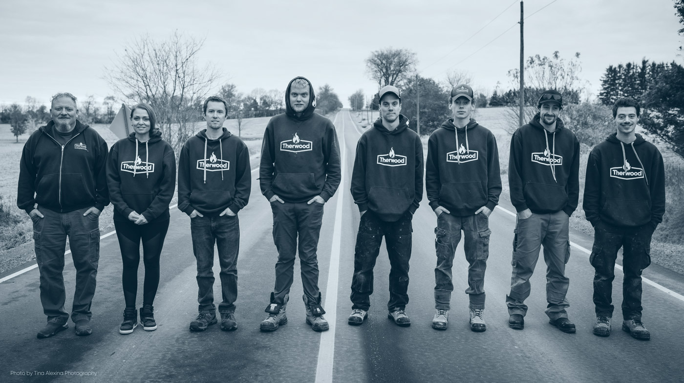 Therwood crew wearing Therwood branded sweaters