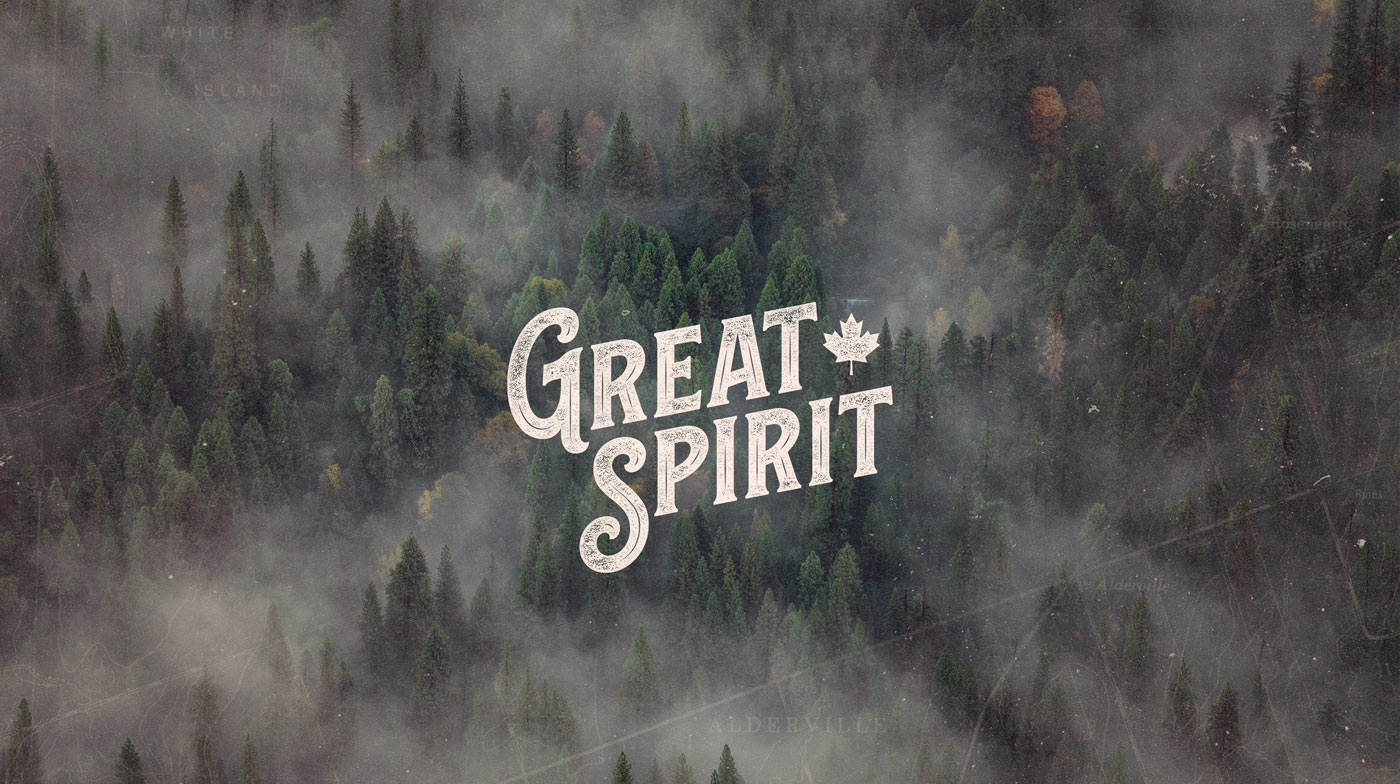 The Great Spirit logo imposed over a misty forest.