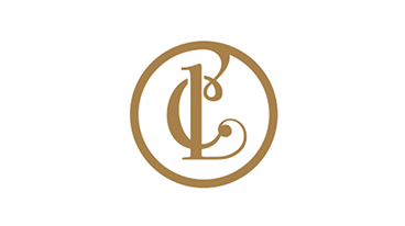 Monogram logo combining the letters L and C in an elegant gold circle.