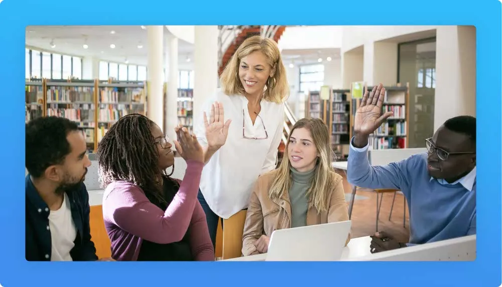 Foundation responsible giving hi-fives to the funded students 