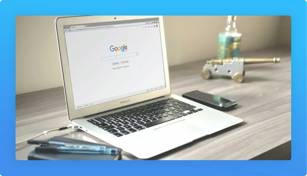 Laptop displaying engine search Google landing page