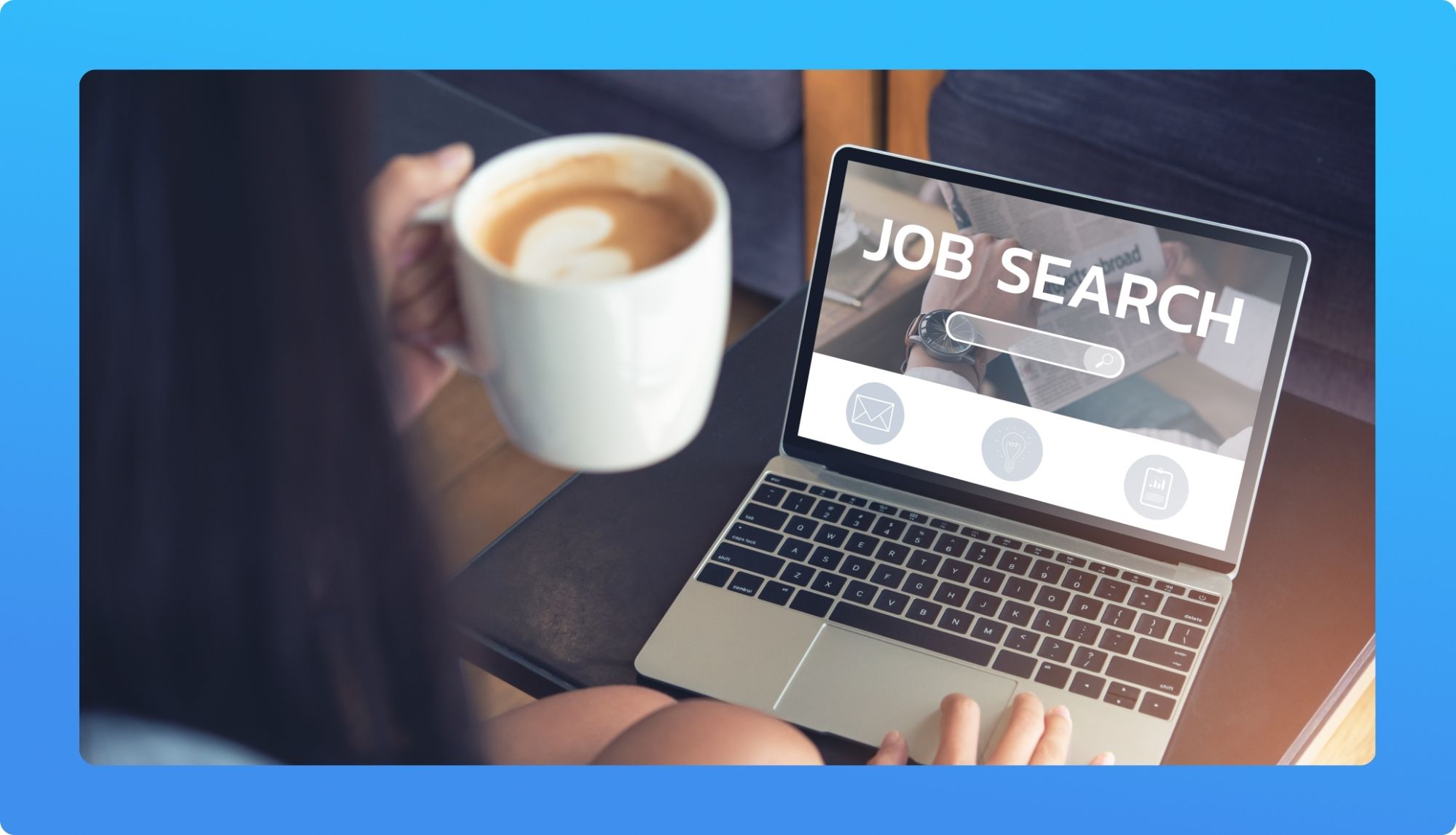 A person holds a coffee cup while looking at a laptop screen displaying a "Job Search" interface.