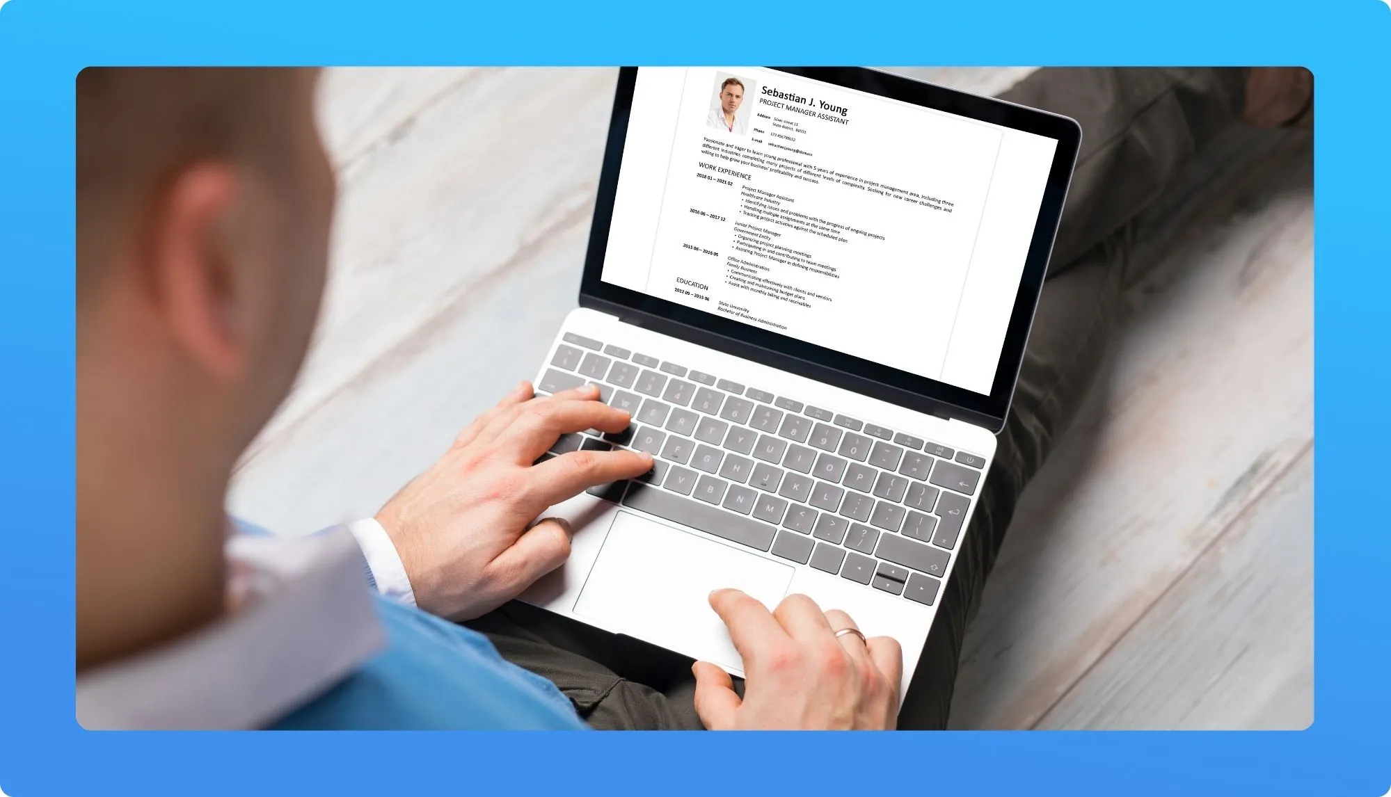 A person types on a laptop, displaying a resume with the name "Sebastian J. Young" and details of work experience and education.