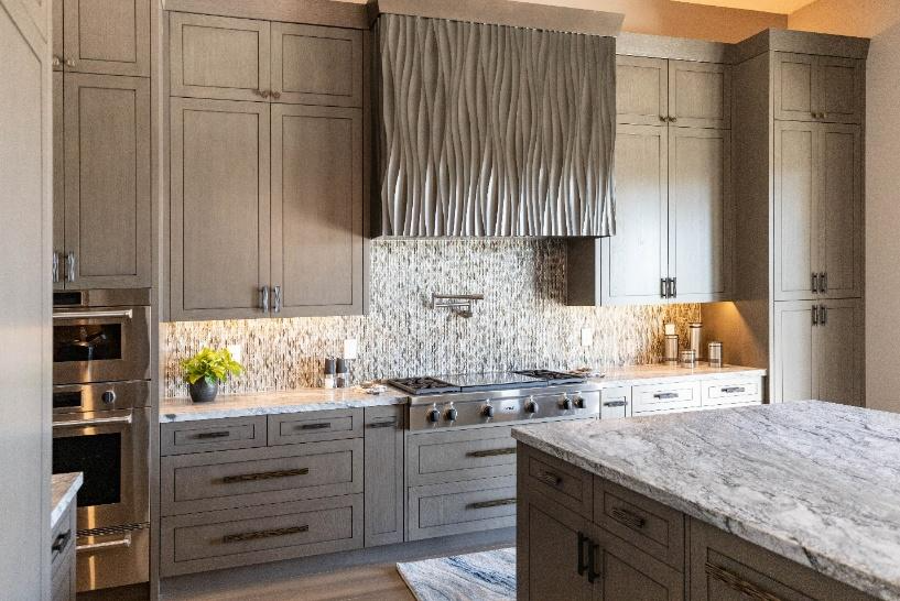 A kitchen with a marble countertopAI-generated content may be incorrect.