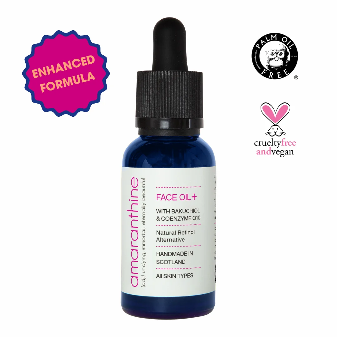 Blue glass bottle of Amaranthine's enhanced Face Oil, a natural anti-ageing face oil that is vegan, cruelty free, and palm oil free.