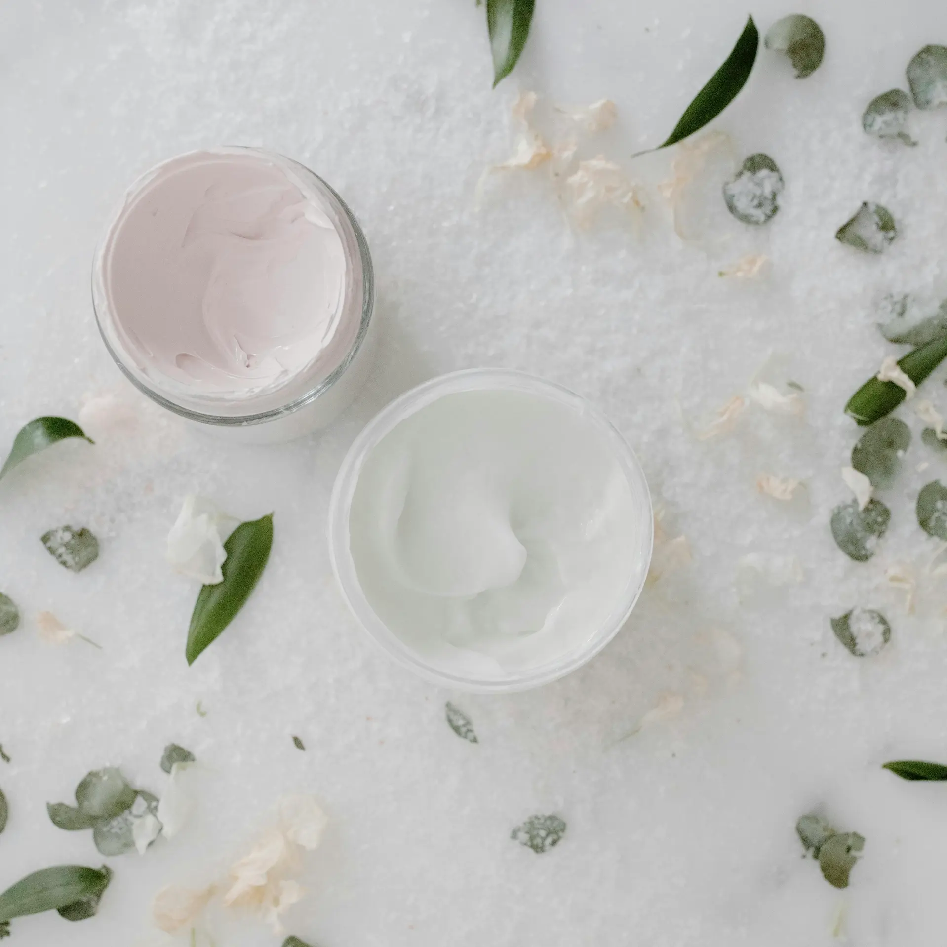 Hydrating face cream textures with natural skincare ingredients supporting the skin barrier.