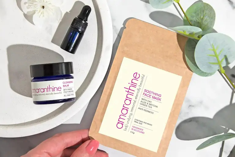 Rosacea skincare minis set including a gentle cleansing balm, face oil, and soothing face mask for sensitive and reactive skin.