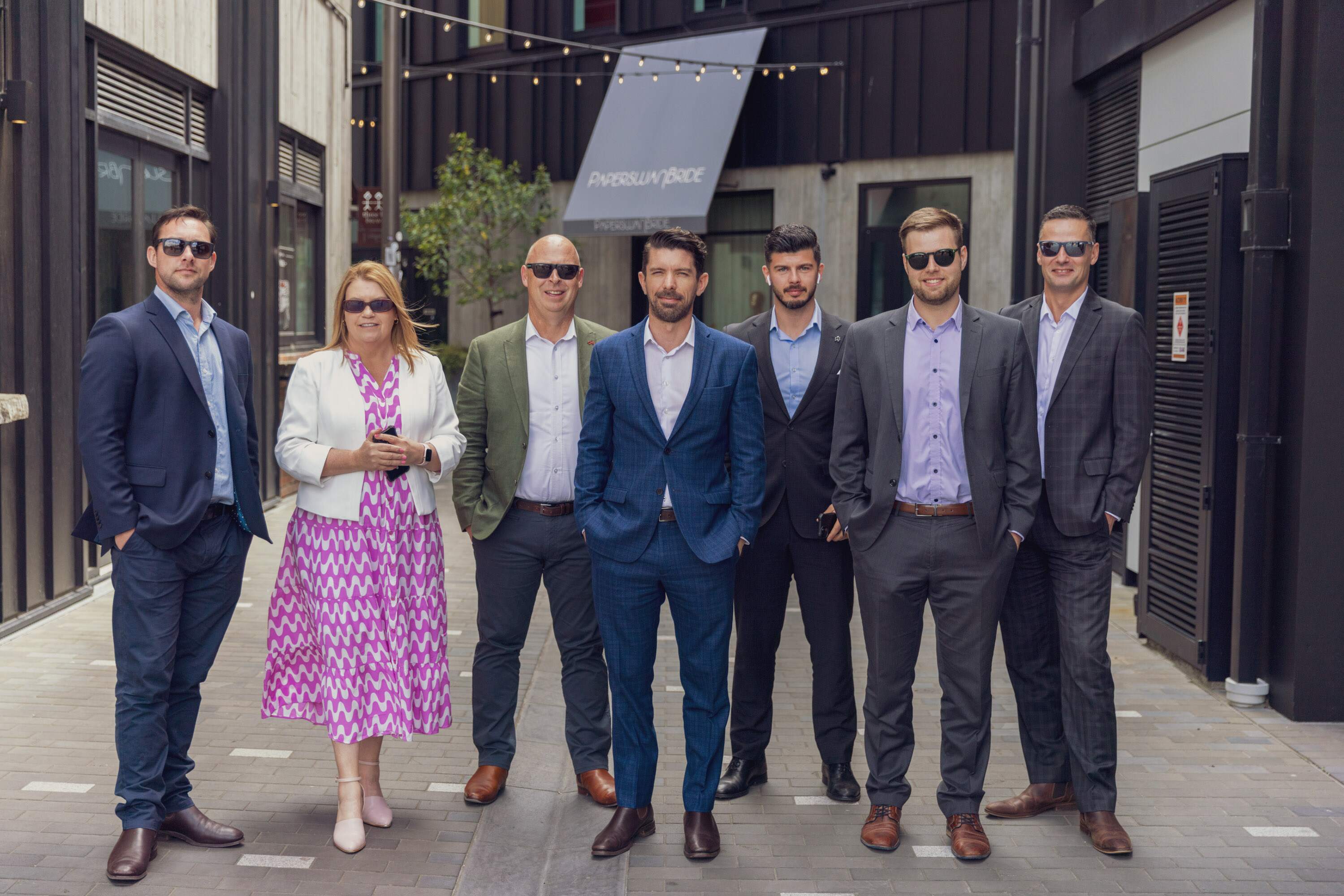 Team at Become Wealth, walking toward camera