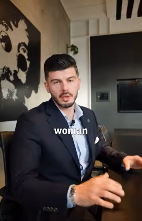 Nik Velkovski, seated in a suit, discusses women, investing and retirement