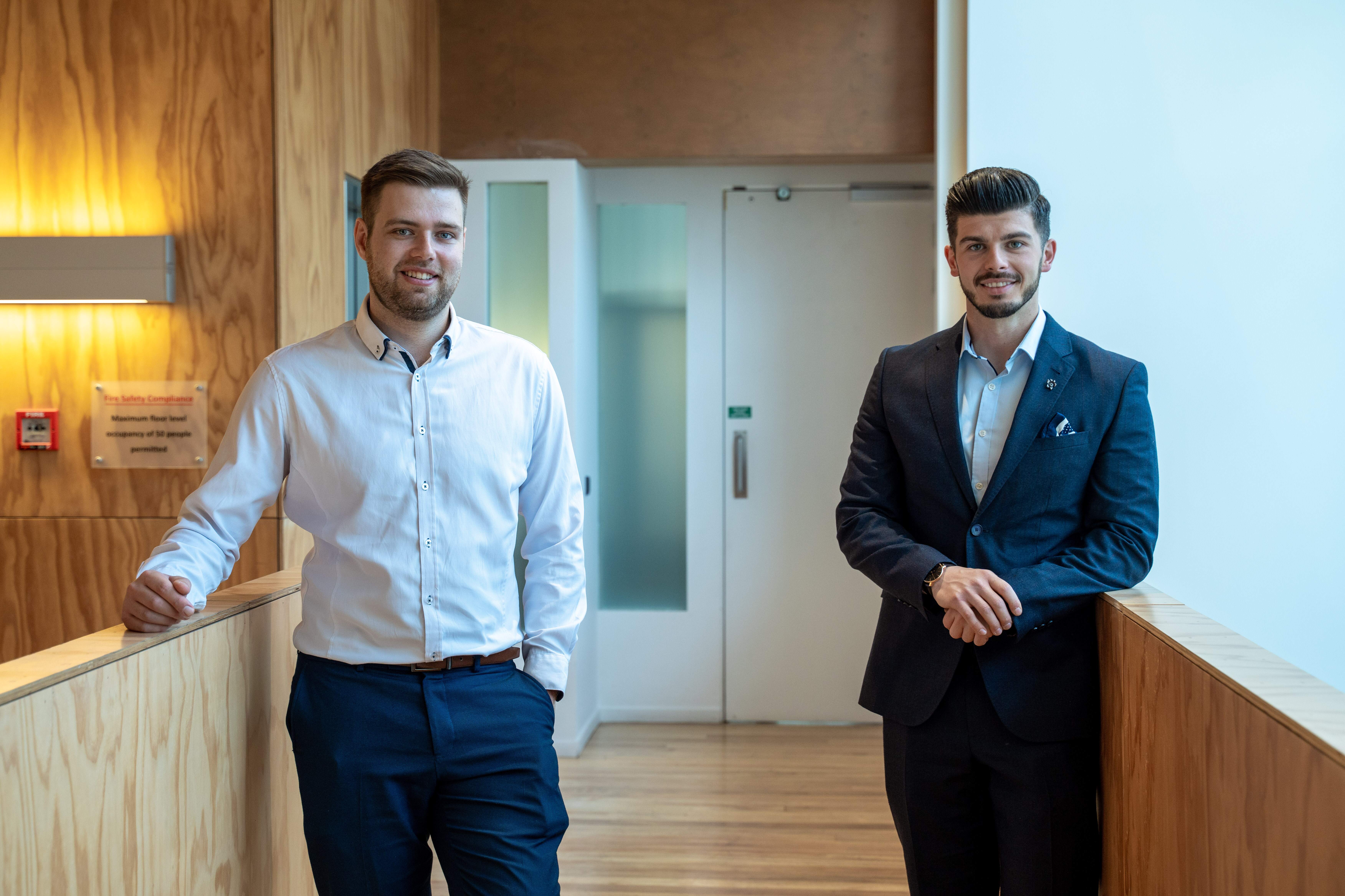 Become Wealth advisers, Josh and Nik, standing facing the camera
