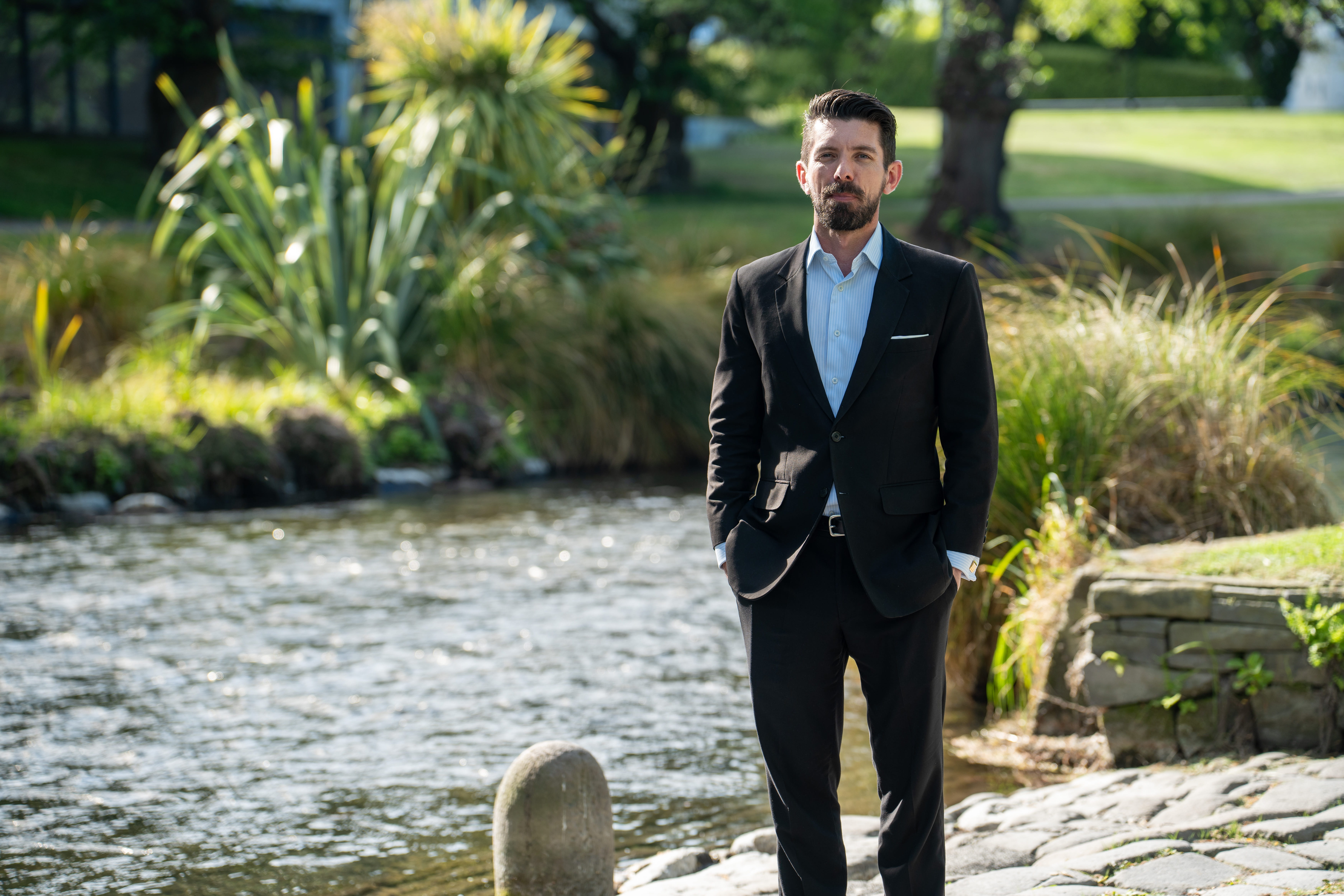 The Become Wealth CEO, Joseph Darby, standing outside