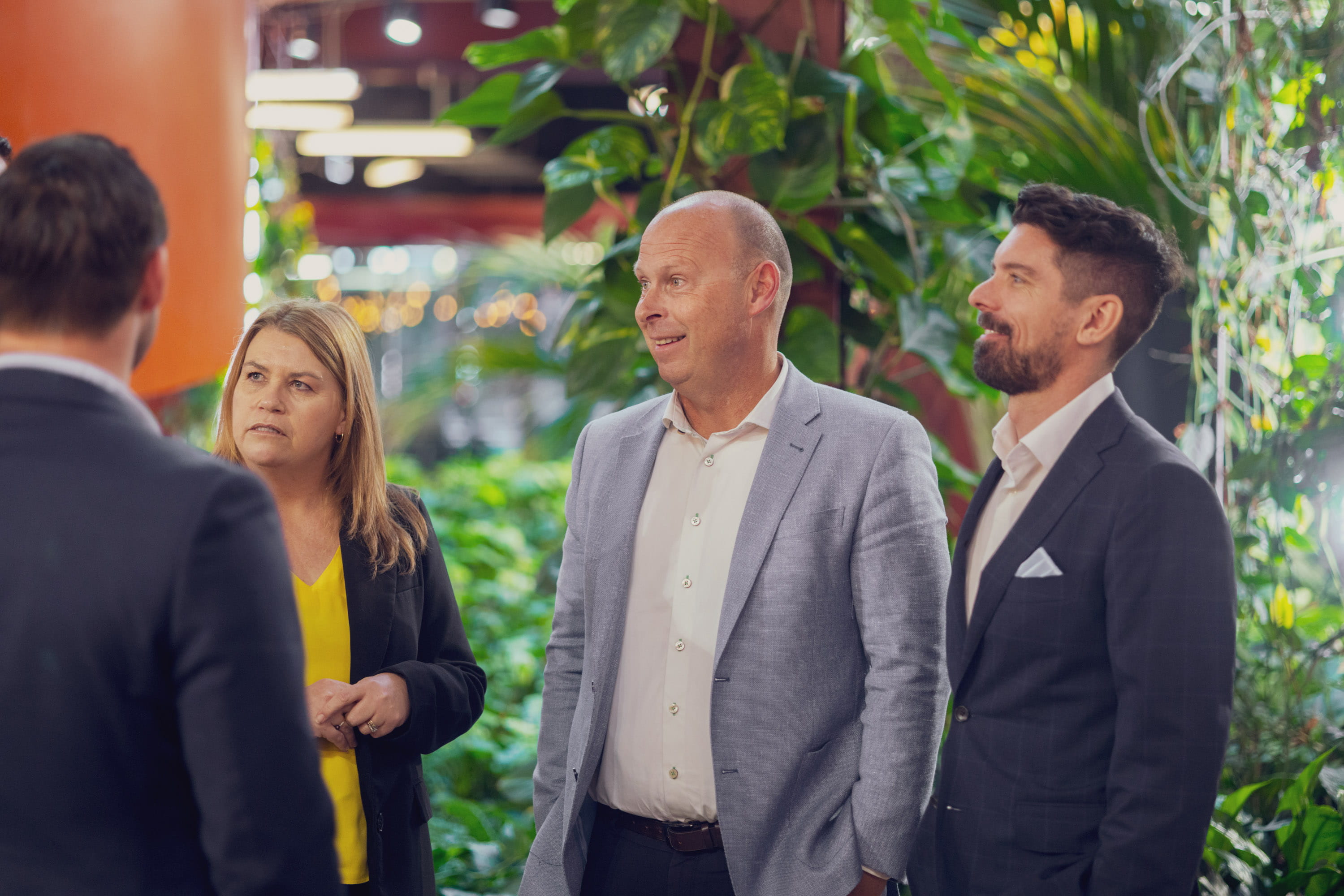 Some of Become Wealth's financial advisers in the Auckland office, laughing