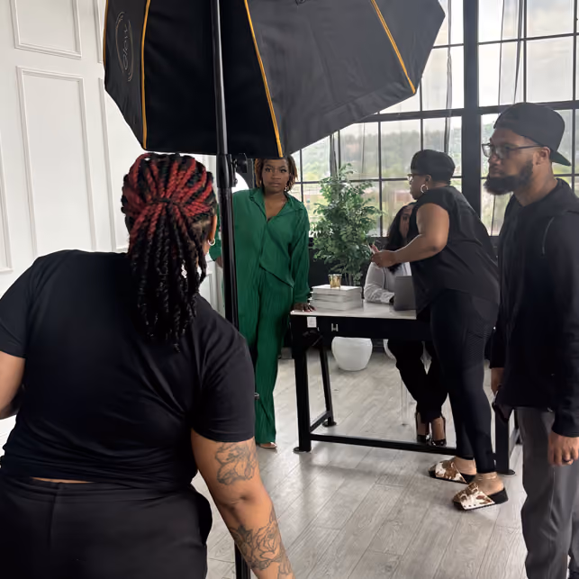 Behind-the-scenes studio lighting setup during a business brand photoshoot for a website redesign