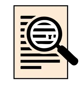  A magnifying glass over a document, highlighting a section of text.