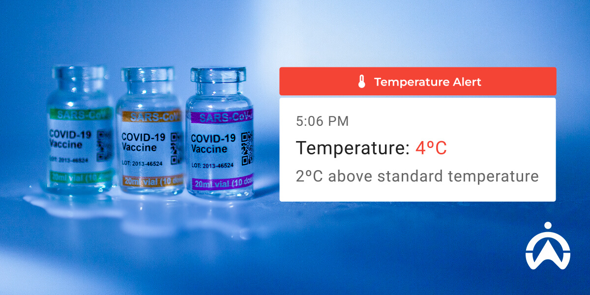 Three COVID-19 vaccine vials with a temperature alert, indicating 4°C, 2°C above the standard temperature.
