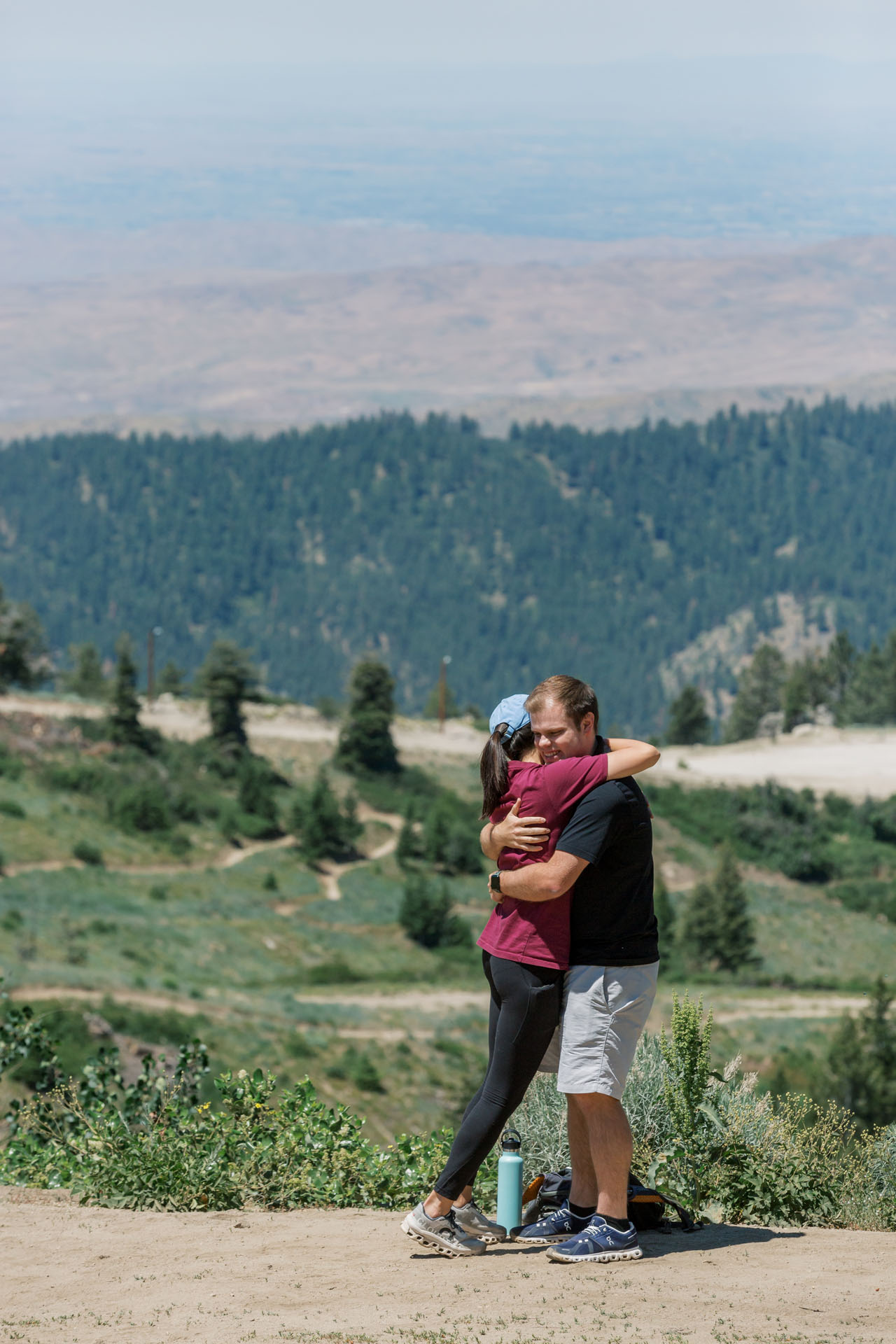 Boise couple hugging after surprise proposal