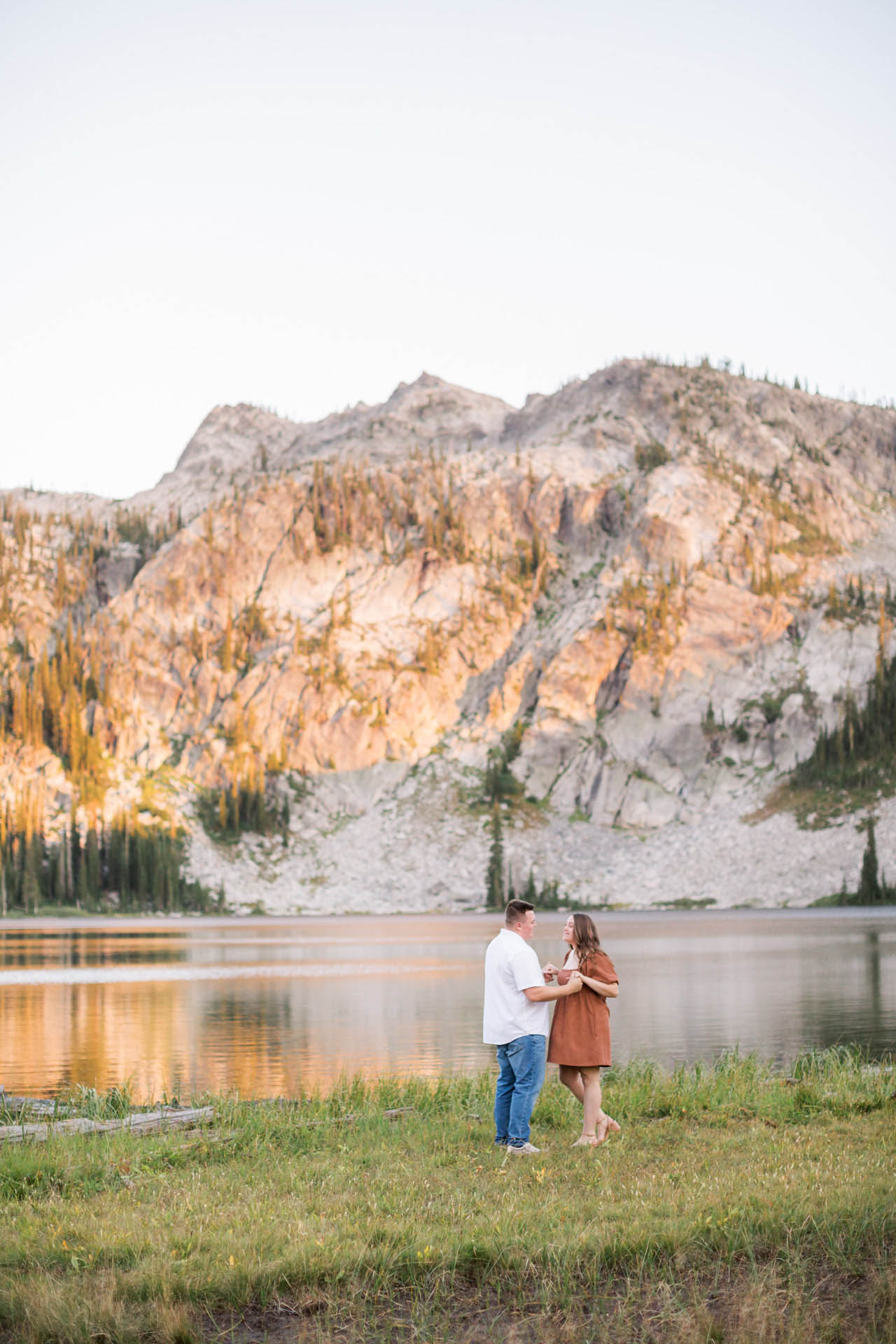 couple dancing by a hidden lake in Idaho