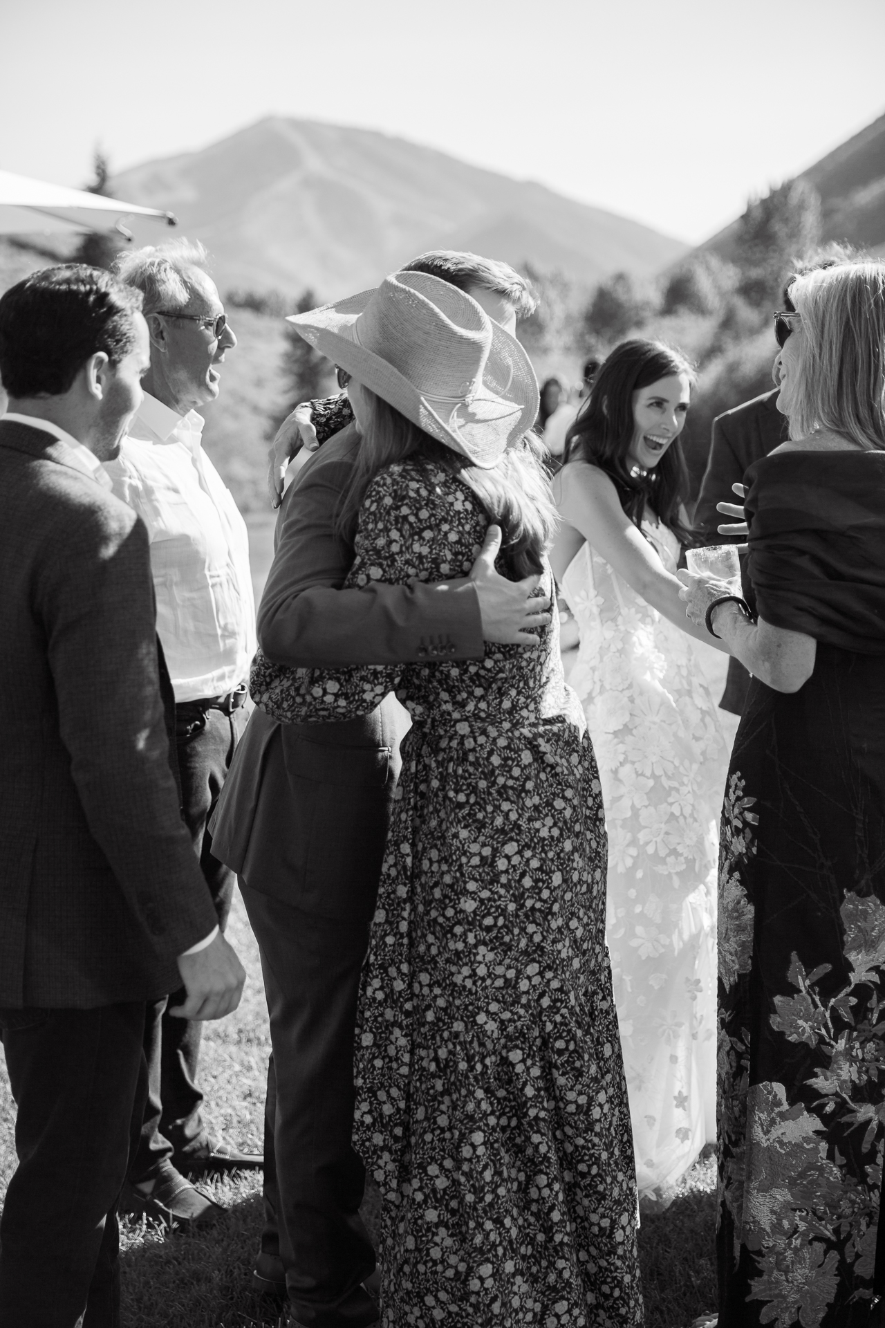 Sun Valley wedding cocktail hour with guests hugging