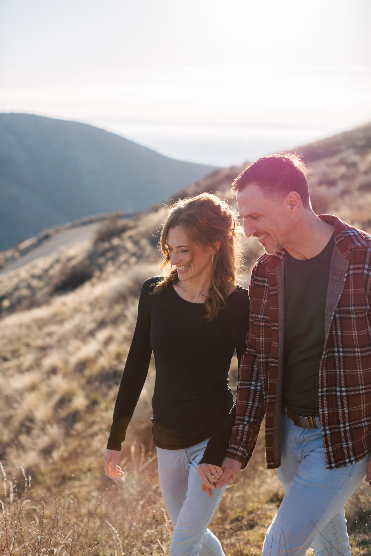 couple walking in the foothills