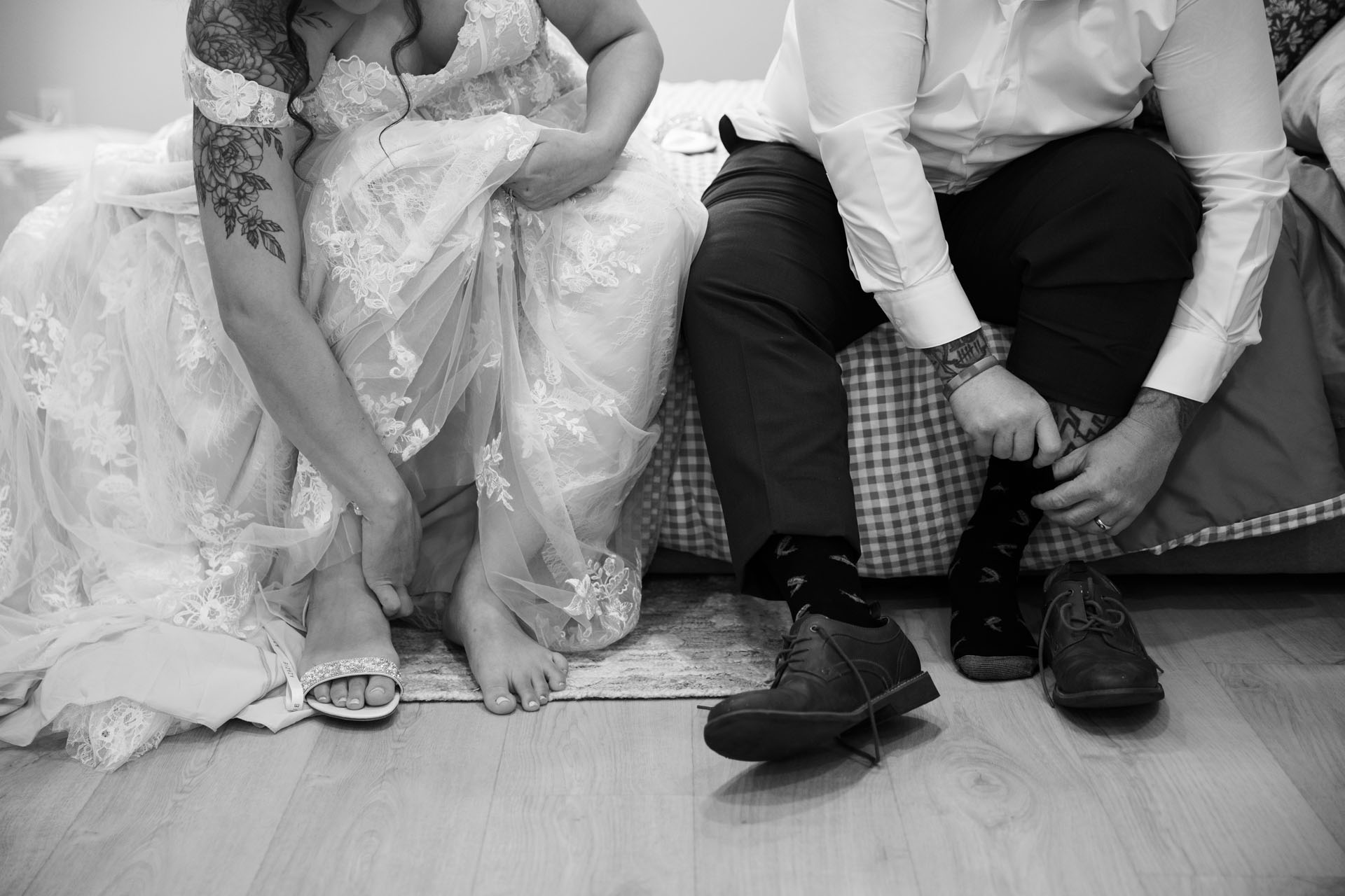 couple putting on shoes together