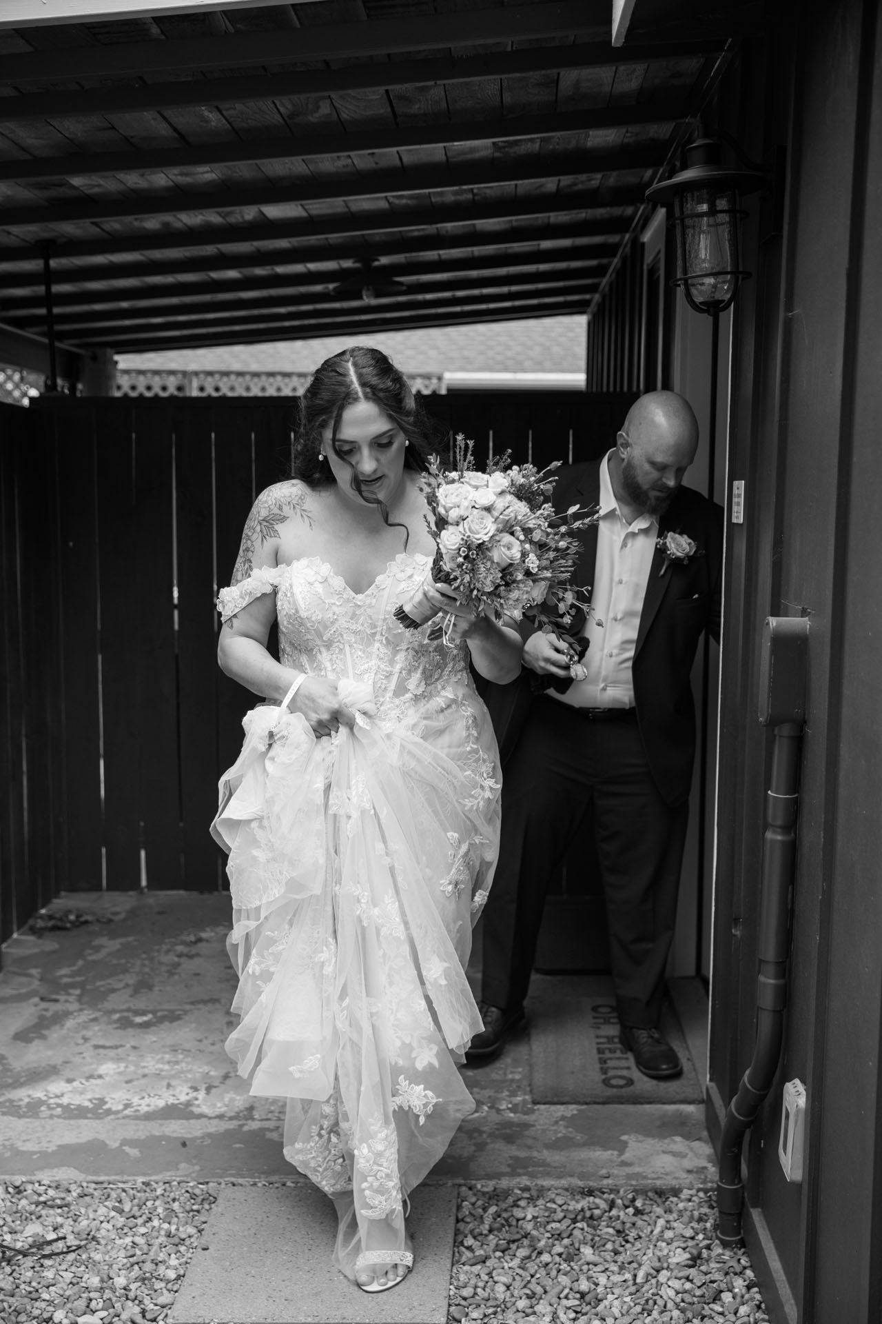 bride and groom leaving their airbnb