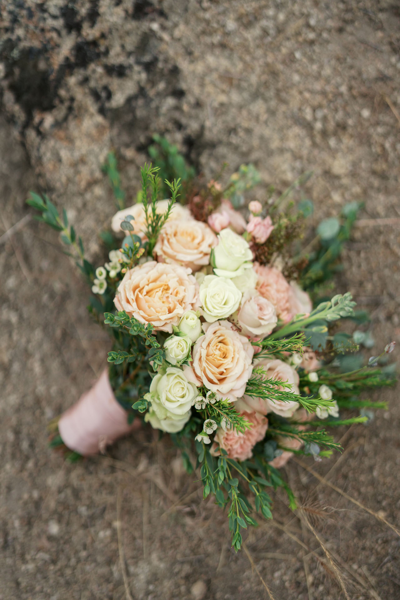 bridal bouquet on a rock