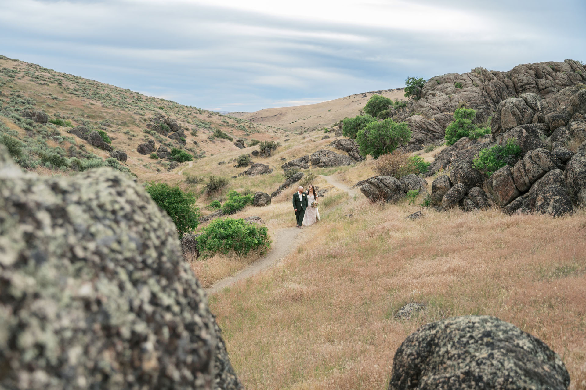 couple walking on a trail in the boise foothills