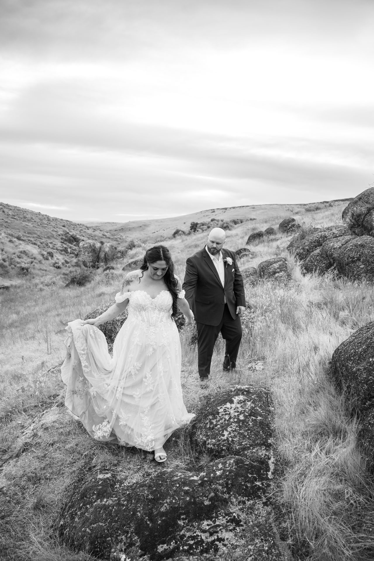 couple walking on the rocks at their elopement