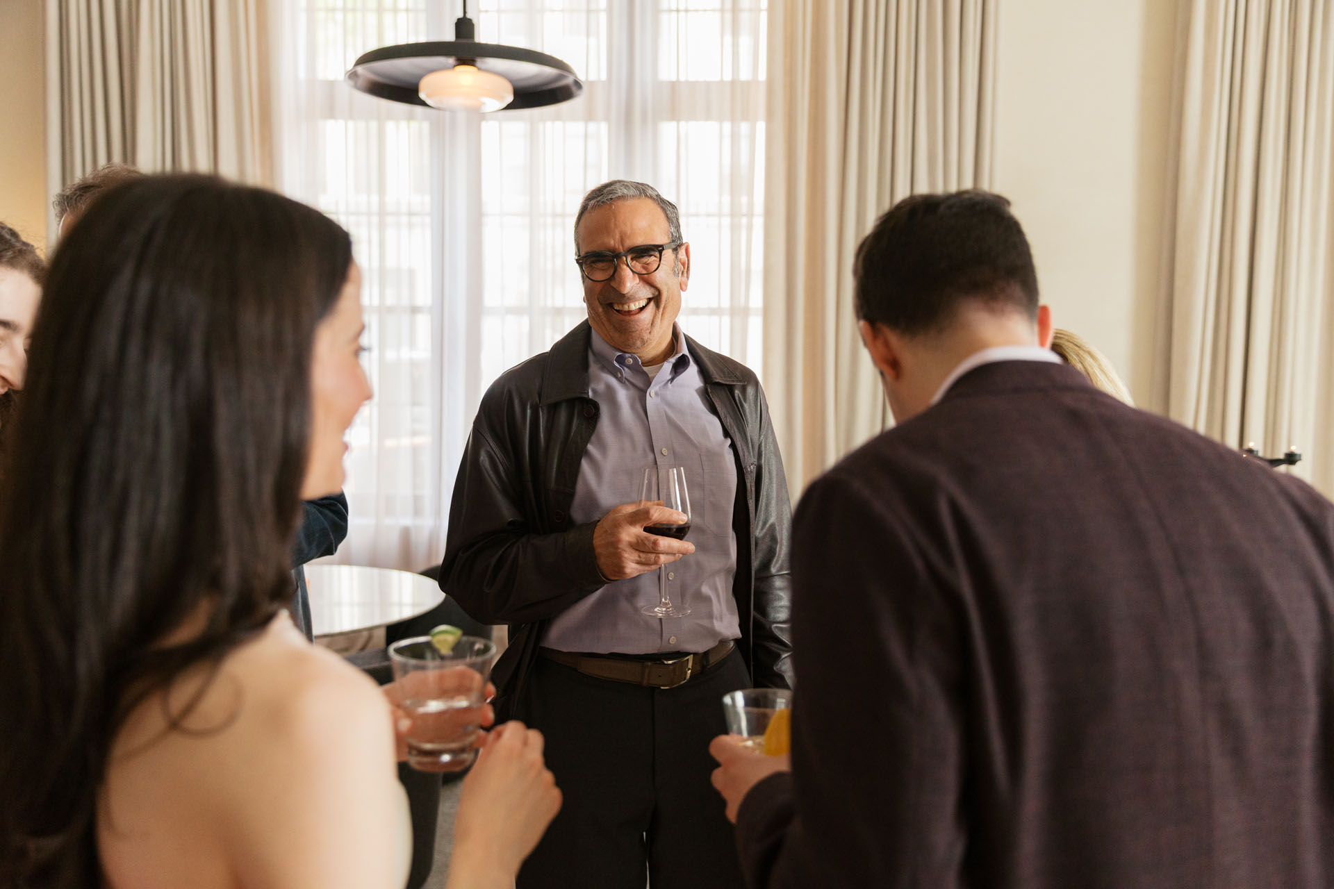 candid photo of guest at welcome party