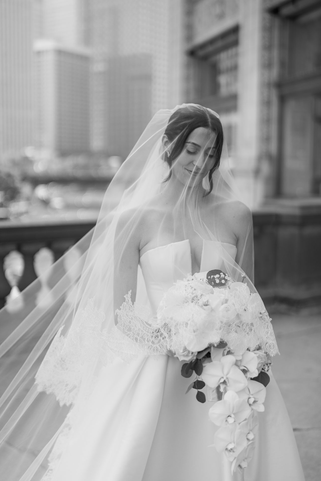 bride with the veil over her face