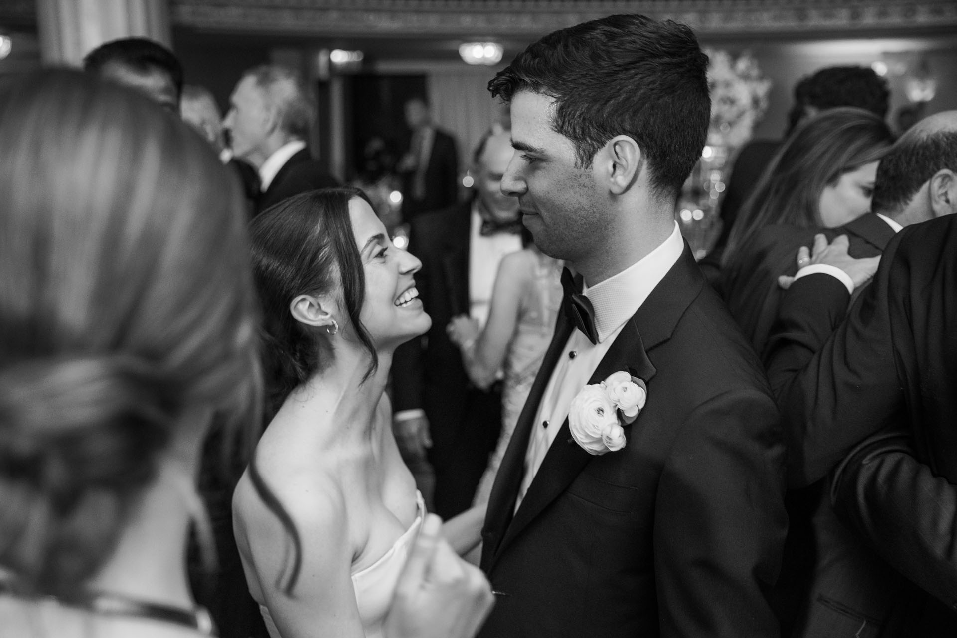 candid black and white portrait of the bride and groom on the dance floor