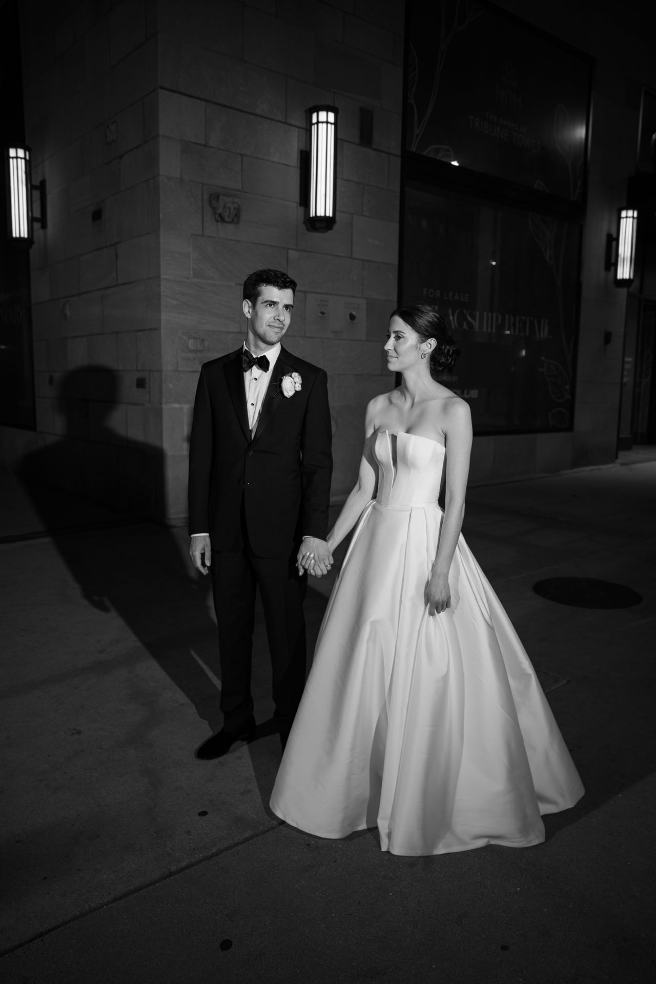 bride and groom standing outside in Chicago