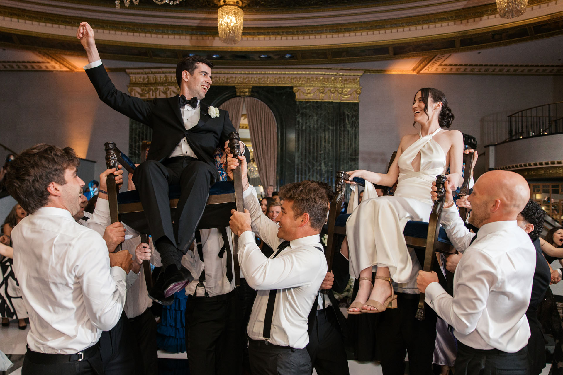 groom and bride during the Hora