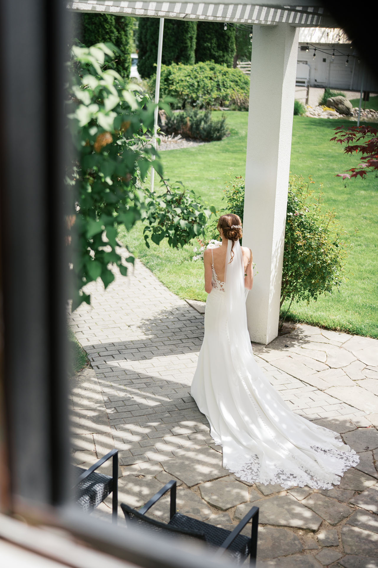 picture of bride through the window