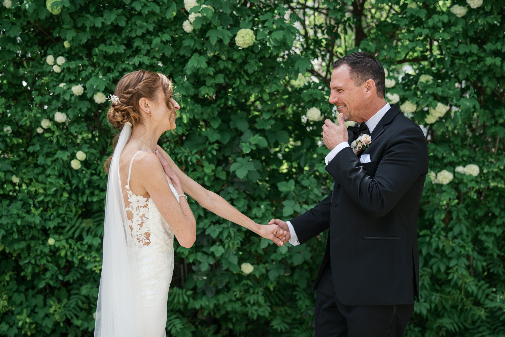 bride and groom's candid reaction to seeing each other on their wedding day