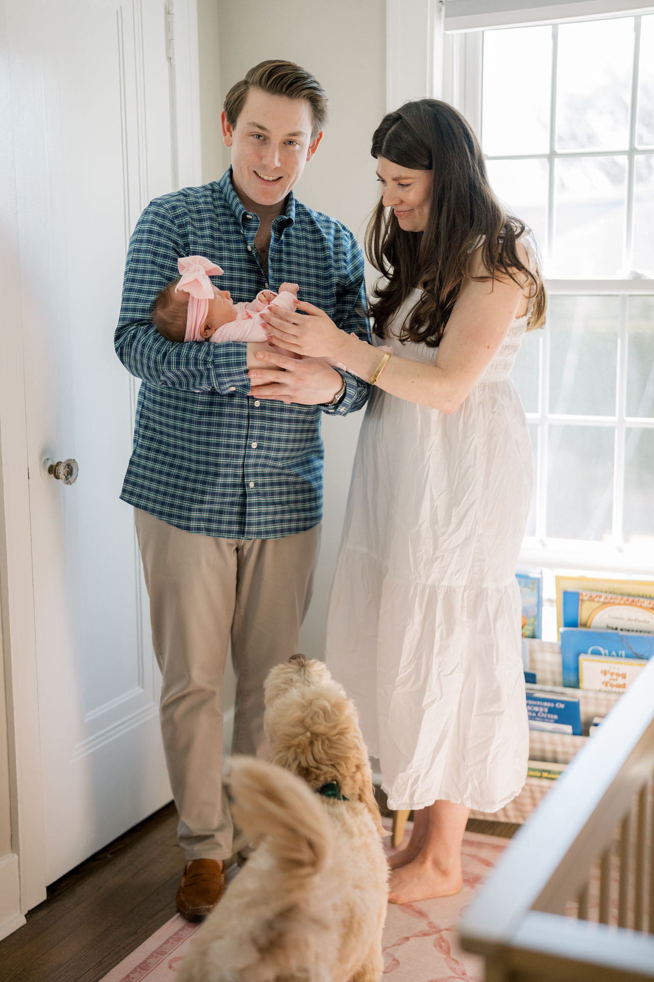 family together in their baby's room
