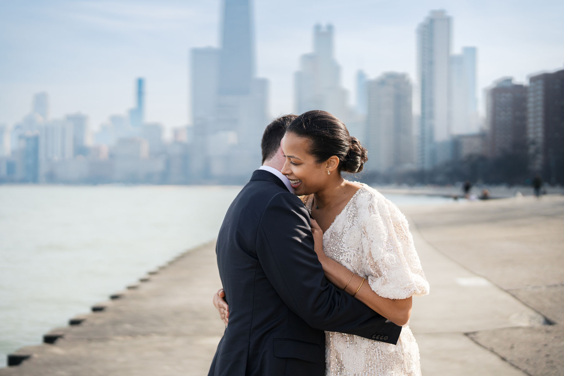 bride and groom hugging