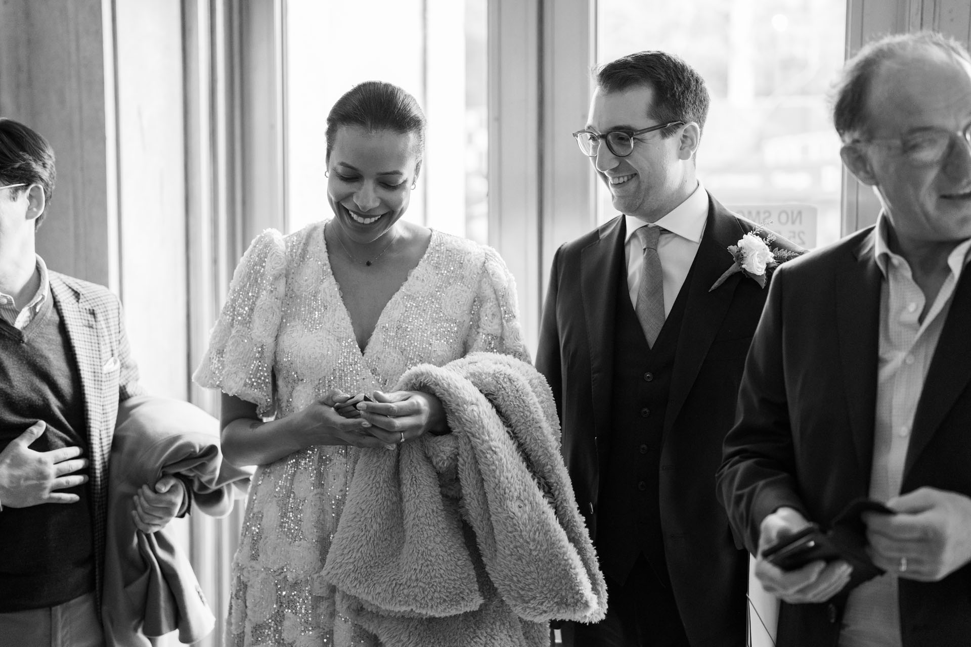 bride and groom in the lobby at City Hall