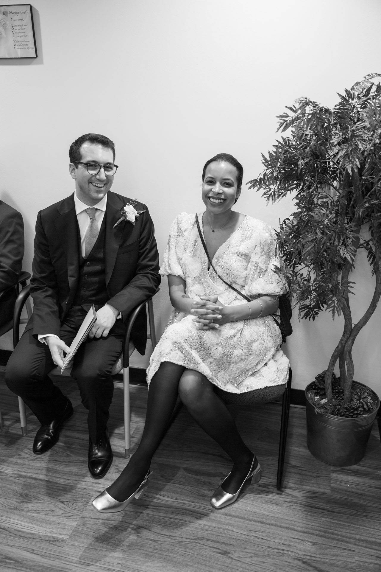 bride and groom in the waiting room at marriage court in Chicago
